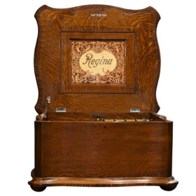 American Regina 15-1/2" Double Comb Music Box in Serpentine Quarter Sawn Oak Case